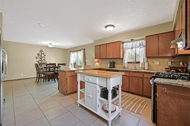 Single level home with views of the Sandias and surrounding on Pueblo de Cochiti Golf Course in New Mexico - for sale on GolfHomes.com, golf home, golf lot