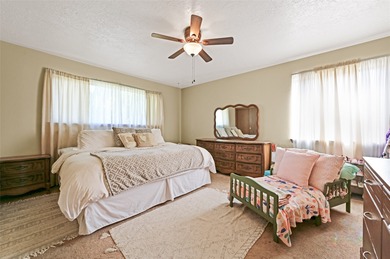 Single level home with views of the Sandias and surrounding on Pueblo de Cochiti Golf Course in New Mexico - for sale on GolfHomes.com, golf home, golf lot