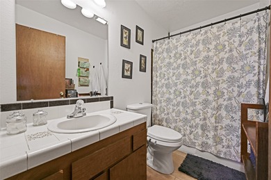 Single level home with views of the Sandias and surrounding on Pueblo de Cochiti Golf Course in New Mexico - for sale on GolfHomes.com, golf home, golf lot