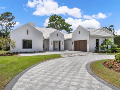 Located behind the private, 24-hour, guarded gates of the on Lake Nona Golf Club, Inc. in Florida - for sale on GolfHomes.com, golf home, golf lot