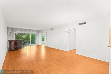 Discover the allure of this condominium with breathtaking golf on  in Florida - for sale on GolfHomes.com, golf home, golf lot