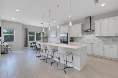 Discover resort-style living in this stunning 5-bedroom, 4-bath on IMG Academies Golf and Country Club in Florida - for sale on GolfHomes.com, golf home, golf lot