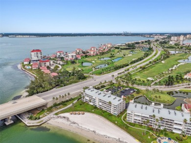 Your tropical waterfront living on Boca Ciega Bay awaits! Escape on Isla Del Sol Yacht and Country Club in Florida - for sale on GolfHomes.com, golf home, golf lot
