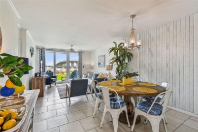 Your tropical waterfront living on Boca Ciega Bay awaits! Escape on Isla Del Sol Yacht and Country Club in Florida - for sale on GolfHomes.com, golf home, golf lot