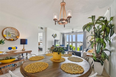 Your tropical waterfront living on Boca Ciega Bay awaits! Escape on Isla Del Sol Yacht and Country Club in Florida - for sale on GolfHomes.com, golf home, golf lot
