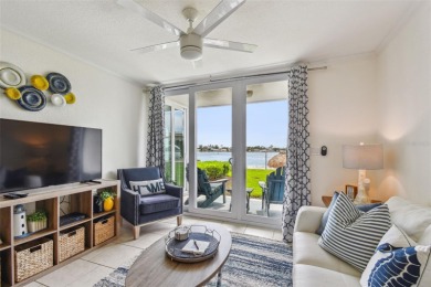 Your tropical waterfront living on Boca Ciega Bay awaits! Escape on Isla Del Sol Yacht and Country Club in Florida - for sale on GolfHomes.com, golf home, golf lot