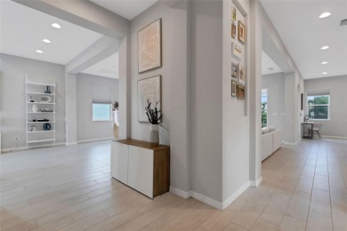 Discover resort-style living in this stunning 5-bedroom, 4-bath on IMG Academies Golf and Country Club in Florida - for sale on GolfHomes.com, golf home, golf lot