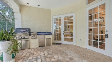 This 4 bedroom with 5 full, and 1 half bath, a new roof and on The Oaks Club in Florida - for sale on GolfHomes.com, golf home, golf lot