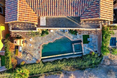 Embrace this thoughtfully designed 7,186 sq foot Italian Villa on South Shore At Lake Las Vegas in Nevada - for sale on GolfHomes.com, golf home, golf lot