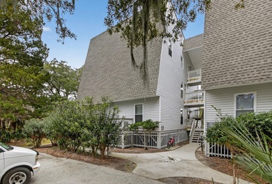 Welcome to effortless coastal living at this exceptional on The Plantation Course At Edisto in South Carolina - for sale on GolfHomes.com, golf home, golf lot
