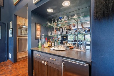 Welcome to luxury! Nestled on nearly an acre across two prime on Holiday Island Golf Course in Arkansas - for sale on GolfHomes.com, golf home, golf lot