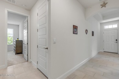 Experience modern elegance and resort-style living in this on Halifax Plantation Golf Club in Florida - for sale on GolfHomes.com, golf home, golf lot