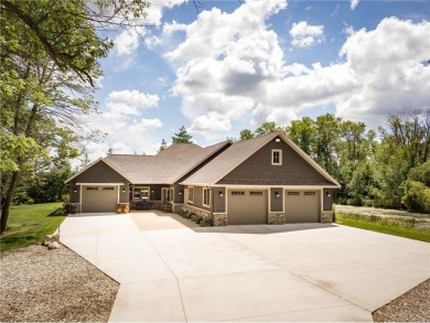 Luxury and privacy at its finest! This one of a kind custom home on Geneva Golf Club in Minnesota - for sale on GolfHomes.com, golf home, golf lot
