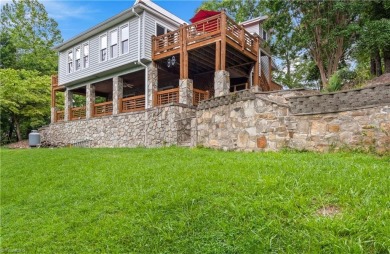 If you've been dreaming of a mountain escape with golf course on Stone Mountain Golf Club in North Carolina - for sale on GolfHomes.com, golf home, golf lot