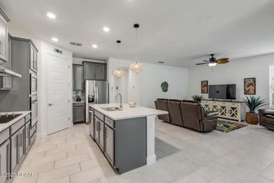 Experience modern elegance and resort-style living in this on Halifax Plantation Golf Club in Florida - for sale on GolfHomes.com, golf home, golf lot