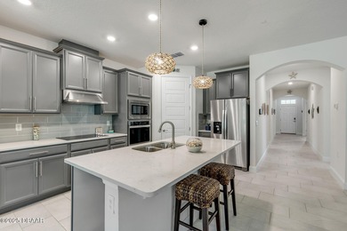 Experience modern elegance and resort-style living in this on Halifax Plantation Golf Club in Florida - for sale on GolfHomes.com, golf home, golf lot