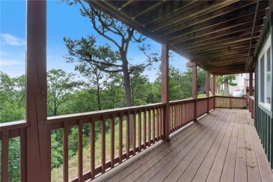 Welcome to luxury! Nestled on nearly an acre across two prime on Holiday Island Golf Course in Arkansas - for sale on GolfHomes.com, golf home, golf lot