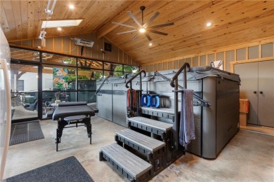 Welcome to luxury! Nestled on nearly an acre across two prime on Holiday Island Golf Course in Arkansas - for sale on GolfHomes.com, golf home, golf lot
