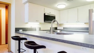 This two-bedroom plus loft, three bath Snowcreek V condo is in on Snowcreek Resort Golf Course in California - for sale on GolfHomes.com, golf home, golf lot