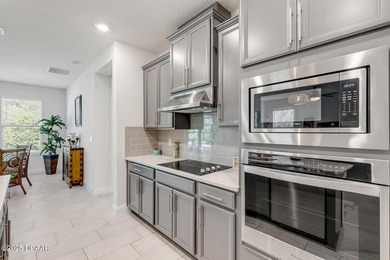 Experience modern elegance and resort-style living in this on Halifax Plantation Golf Club in Florida - for sale on GolfHomes.com, golf home, golf lot