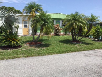 Move in and enjoy all that Spanish Lakes has to offer.  Lot rent on Spanish Lakes I in Florida - for sale on GolfHomes.com, golf home, golf lot