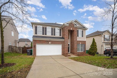 This stunning home is filled with natural light, highlighting on Highland Creek Golf Club in North Carolina - for sale on GolfHomes.com, golf home, golf lot