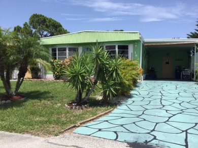 Move in and enjoy all that Spanish Lakes has to offer.  Lot rent on Spanish Lakes I in Florida - for sale on GolfHomes.com, golf home, golf lot