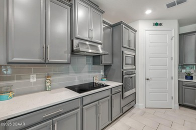 Experience modern elegance and resort-style living in this on Halifax Plantation Golf Club in Florida - for sale on GolfHomes.com, golf home, golf lot