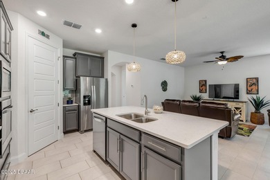 Experience modern elegance and resort-style living in this on Halifax Plantation Golf Club in Florida - for sale on GolfHomes.com, golf home, golf lot