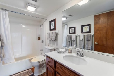 Welcome to luxury! Nestled on nearly an acre across two prime on Holiday Island Golf Course in Arkansas - for sale on GolfHomes.com, golf home, golf lot