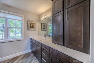 This exceptional 2 bedroom, 2 bath condo has been thoughtfully on Seasons Ridge At Four Seasons in Missouri - for sale on GolfHomes.com, golf home, golf lot