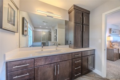 This exceptional 2 bedroom, 2 bath condo has been thoughtfully on Seasons Ridge At Four Seasons in Missouri - for sale on GolfHomes.com, golf home, golf lot