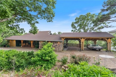 Welcome to luxury! Nestled on nearly an acre across two prime on Holiday Island Golf Course in Arkansas - for sale on GolfHomes.com, golf home, golf lot