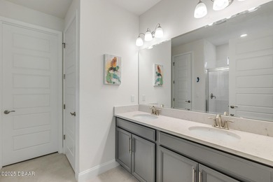 Experience modern elegance and resort-style living in this on Halifax Plantation Golf Club in Florida - for sale on GolfHomes.com, golf home, golf lot