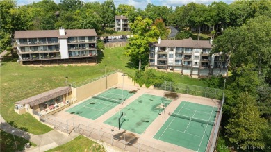 This exceptional 2 bedroom, 2 bath condo has been thoughtfully on Seasons Ridge At Four Seasons in Missouri - for sale on GolfHomes.com, golf home, golf lot