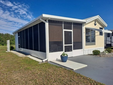 This Home Is Immaculate in Everyway ! Situated Right On the Lake on Riverwood Golf Club in Florida - for sale on GolfHomes.com, golf home, golf lot