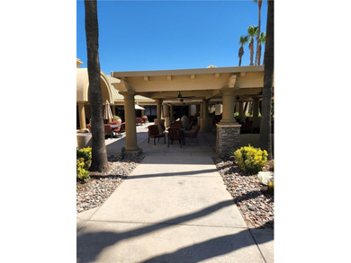 Pour yourself your favorite beverage and set back and enjoy the on Sun Lakes Country Club in California - for sale on GolfHomes.com, golf home, golf lot