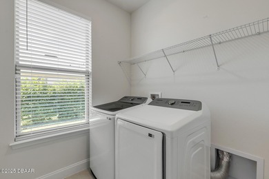 Experience modern elegance and resort-style living in this on Halifax Plantation Golf Club in Florida - for sale on GolfHomes.com, golf home, golf lot