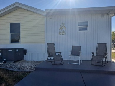 This Home Is Immaculate in Everyway ! Situated Right On the Lake on Riverwood Golf Club in Florida - for sale on GolfHomes.com, golf home, golf lot