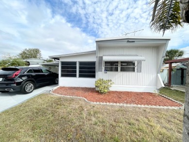 FULLY FURNISHED!!! This home is located in a 55+ community!! on Lone Palm Golf Club in Florida - for sale on GolfHomes.com, golf home, golf lot