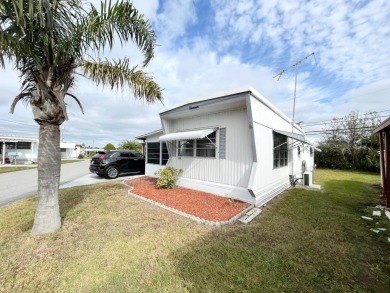 FULLY FURNISHED!!! This home is located in a 55+ community!! on Lone Palm Golf Club in Florida - for sale on GolfHomes.com, golf home, golf lot