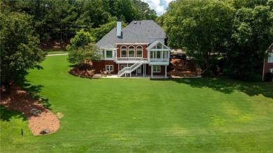 Stately executive home located on the 16th Fairway of the on Woodmont Golf and Country Club in Georgia - for sale on GolfHomes.com, golf home, golf lot