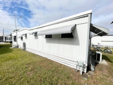 FULLY FURNISHED!!! This home is located in a 55+ community!! on Lone Palm Golf Club in Florida - for sale on GolfHomes.com, golf home, golf lot