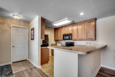 Vaulted ceilings in the great room and plenty of sunlight make on International Club of Myrtle Beach in South Carolina - for sale on GolfHomes.com, golf home, golf lot