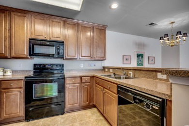 Vaulted ceilings in the great room and plenty of sunlight make on International Club of Myrtle Beach in South Carolina - for sale on GolfHomes.com, golf home, golf lot