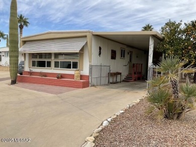 Very nice updated and furnished home with laminate flooring on Tucson Estates Golf Course in Arizona - for sale on GolfHomes.com, golf home, golf lot
