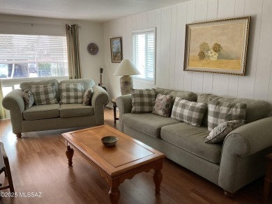 Very nice updated and furnished home with laminate flooring on Tucson Estates Golf Course in Arizona - for sale on GolfHomes.com, golf home, golf lot