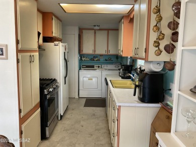 Very nice updated and furnished home with laminate flooring on Tucson Estates Golf Course in Arizona - for sale on GolfHomes.com, golf home, golf lot