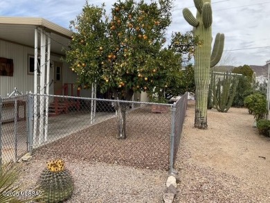 Very nice updated and furnished home with laminate flooring on Tucson Estates Golf Course in Arizona - for sale on GolfHomes.com, golf home, golf lot