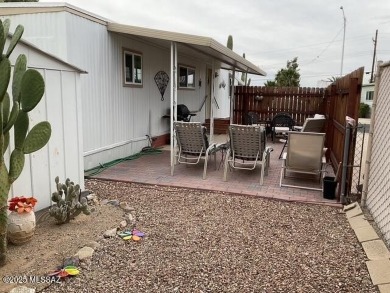 Very nice updated and furnished home with laminate flooring on Tucson Estates Golf Course in Arizona - for sale on GolfHomes.com, golf home, golf lot